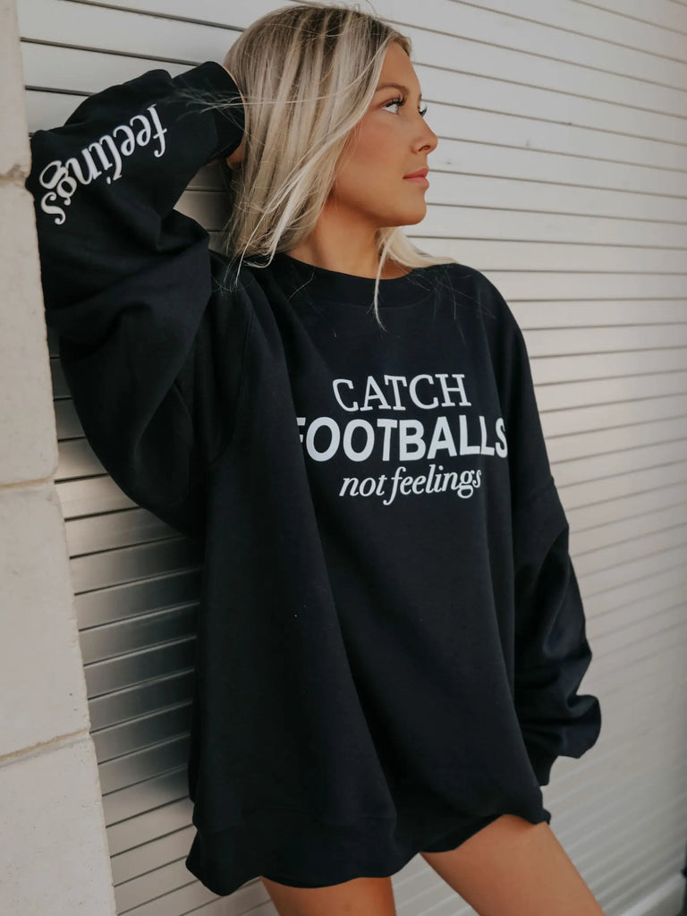 Catch Footballs Not Feelings Sweatshirt
